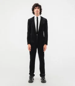 Fluwelen jumpsuit met diepe V-snede en aansluitende pasvorm
