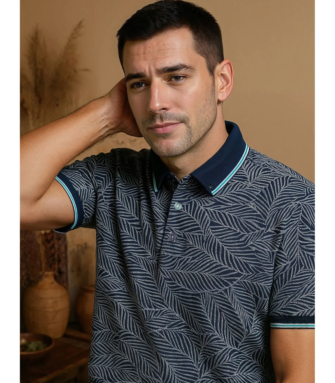 Heren poloshirt met blauw bladprint