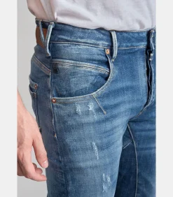 Jeans tapered , lengte 34
