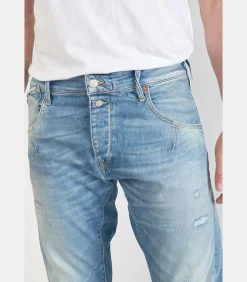 Jeans tapered , lengte 34