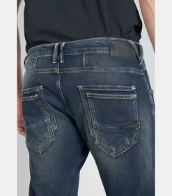 Jeans tapered , lengte 34